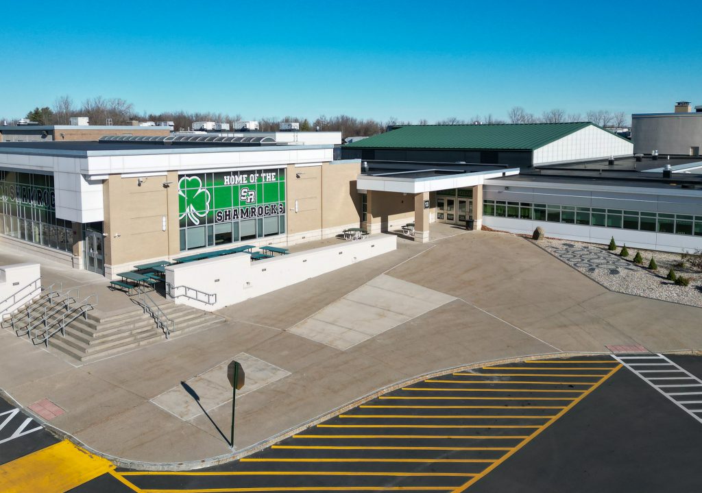 A building with text that says 'Home of the Shamrocks' on it